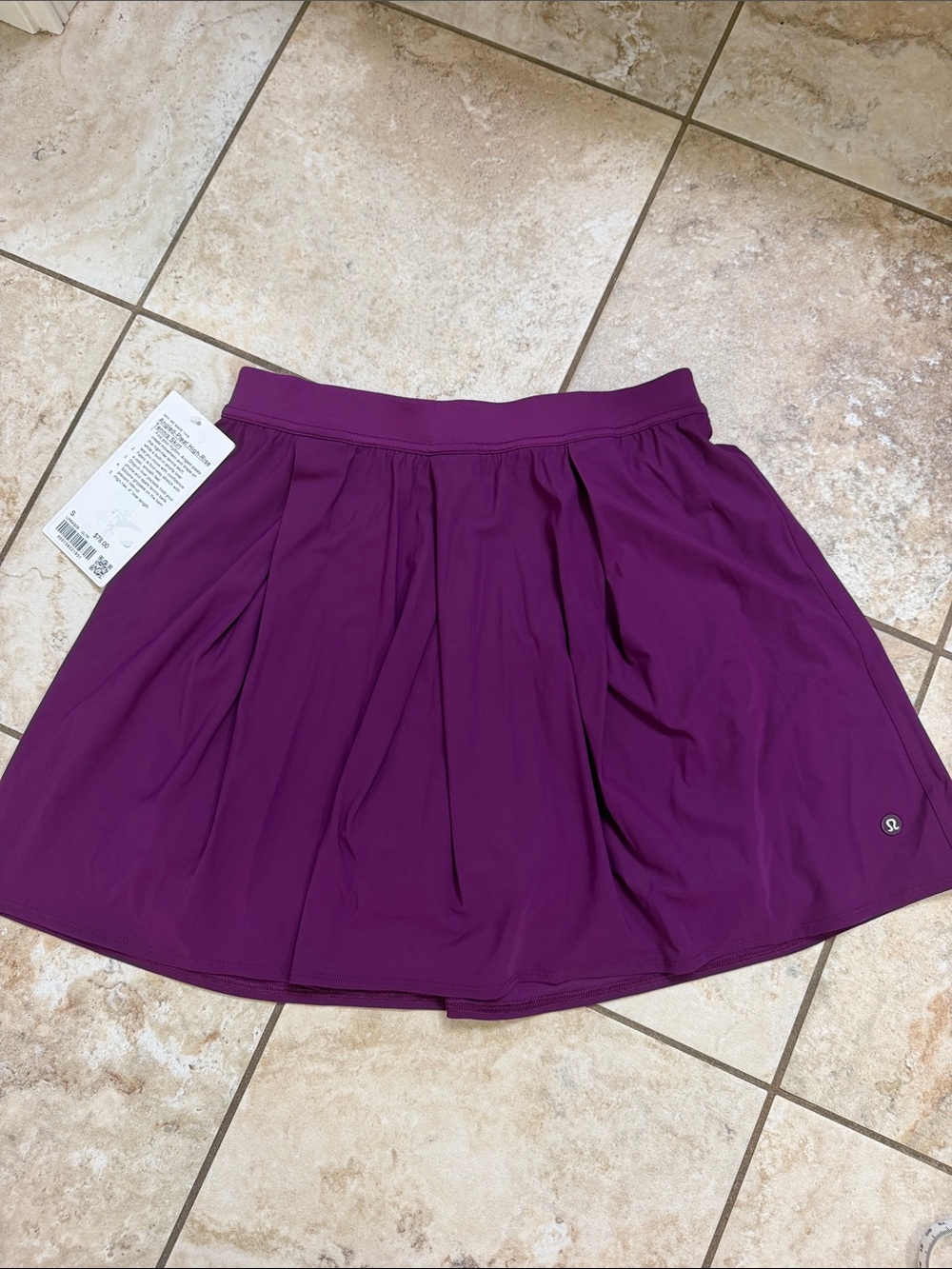 lululemon Angled-Pleat high rise Tennis skirt. Size S. Ultra Plum